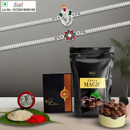 Rakhi Gift Combo With 2 Elegant Rakhis For Brother  Includes Choco Magic Pack Silver Coin Roli Chawal  Greeting Card Rakhi Gift Combo With 2 Elegant Rakhis For Brother  Includes Choco Magic Pack Silver Coin Roli Chawal  Greeting Card